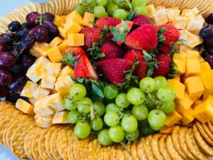 cheese and cracker tray with fruit